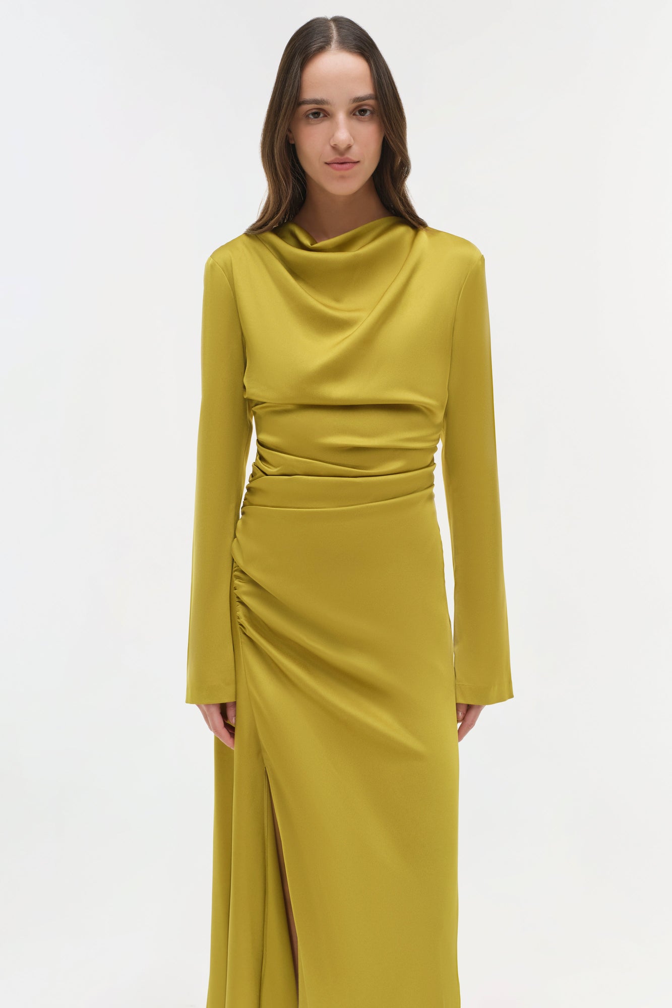 Olive-gold satin midi dress with cowl neckline, ruched waist, and side slit detail.