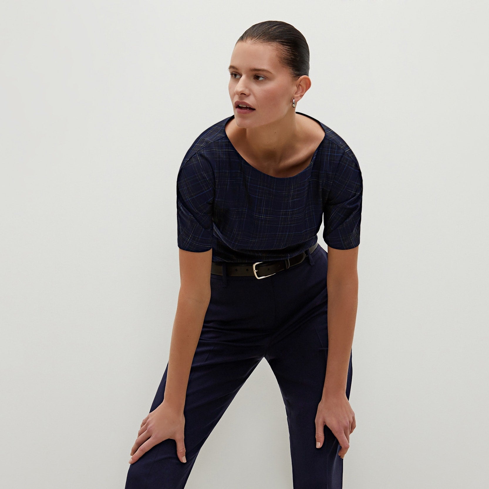 Front image of a woman standing wearing the Mejia pant in Galaxy Blue | Exclude