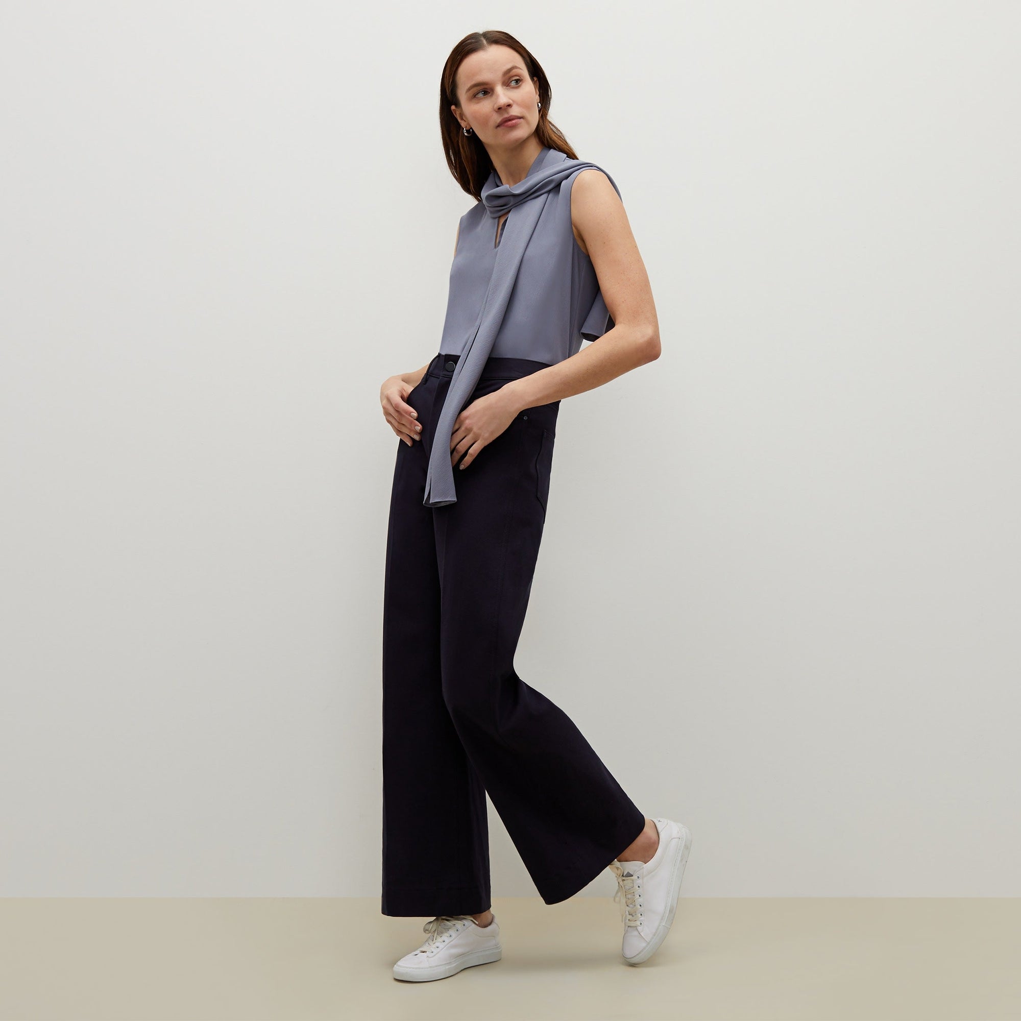 Front image of a woman standing wearing the Milo Jean in ink | Exclude