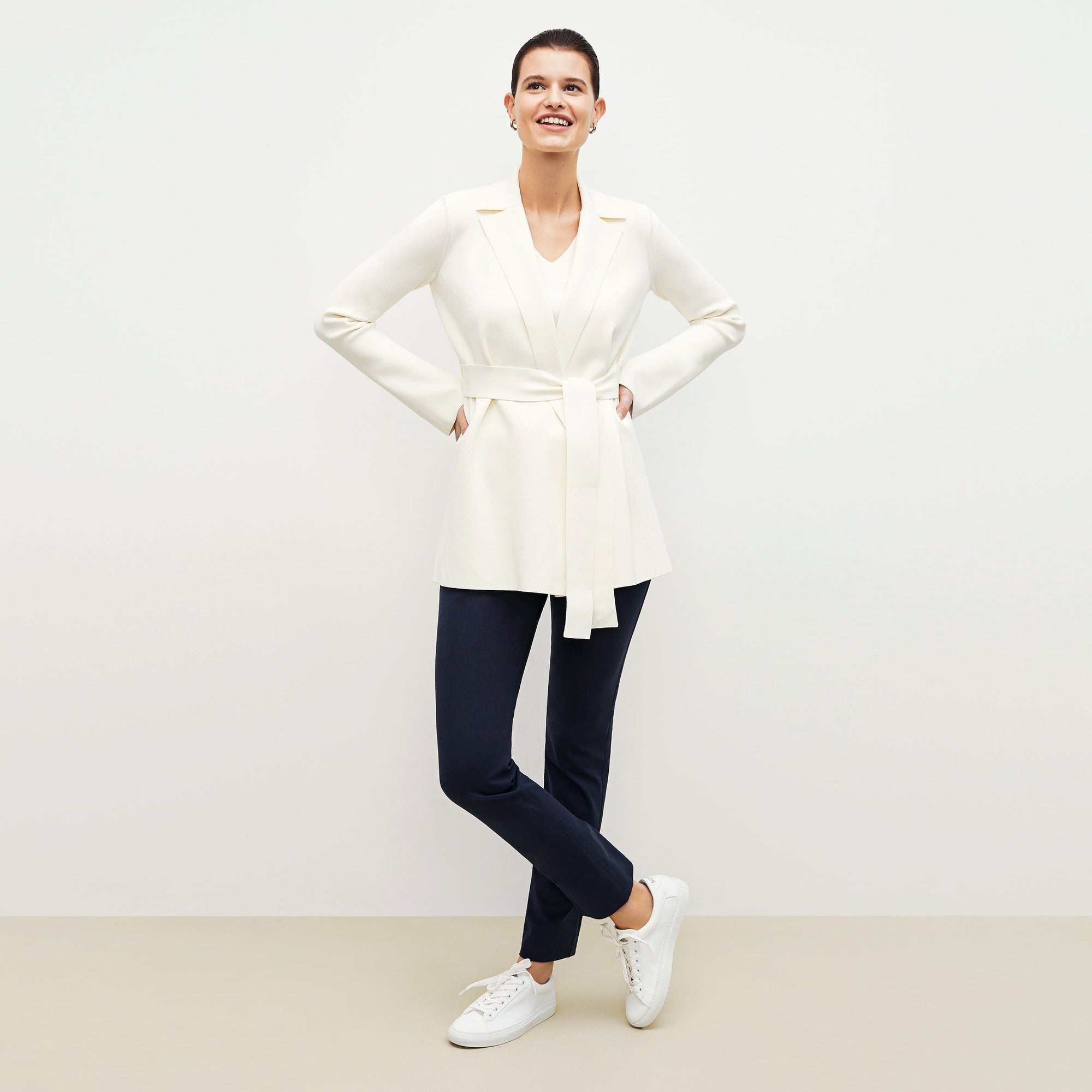Front image of a woman standing wearing the Hockley pant in ink | Exclude