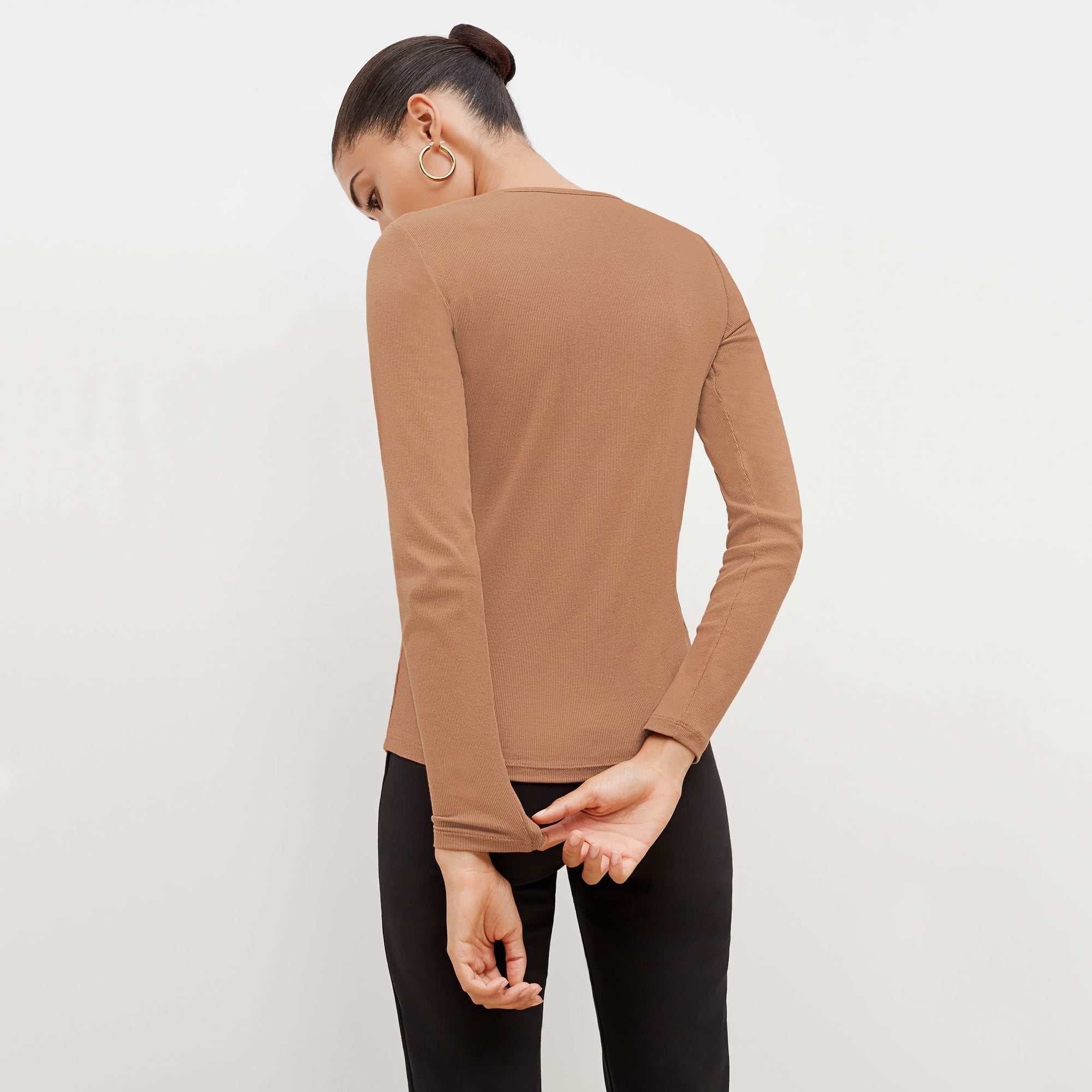 Back image of a woman standing wearing the marcia in camel | Exclude