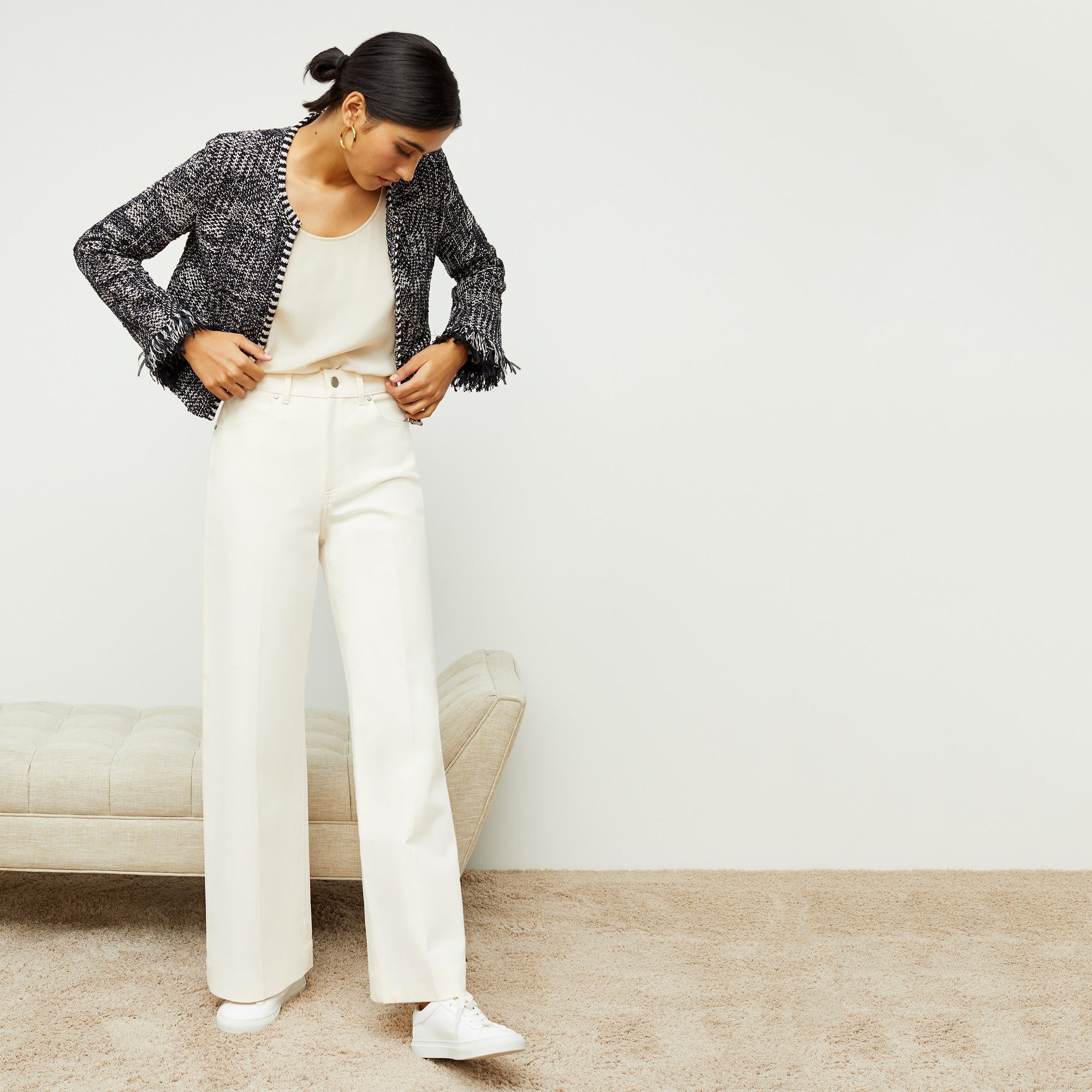 Front image of a woman standing wearing the milo jean in tusk | Exclude