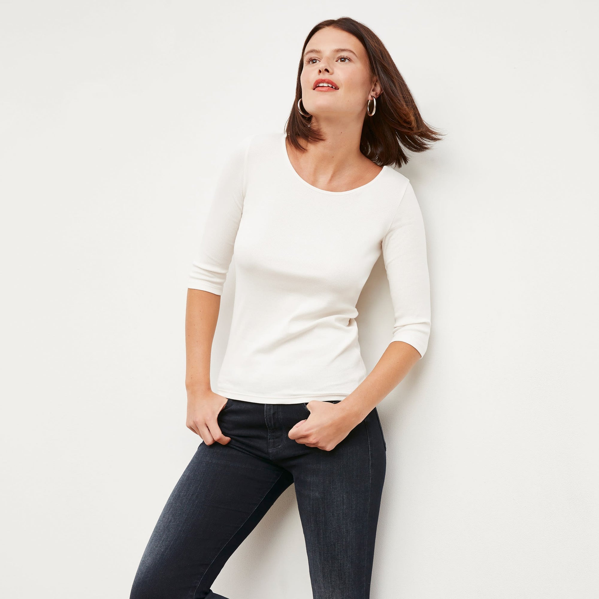 Front image of a woman wearing the Soyoung top in Ivory | Lead
