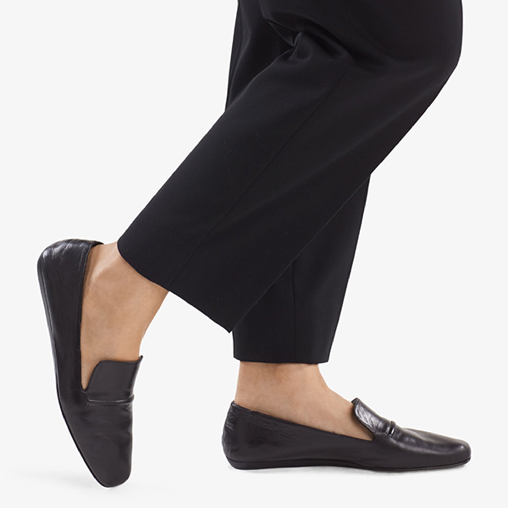 image of a woman wearing the Grace Loafer—Kidskin in Black