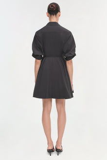 Black shirt dress with rolled short sleeves, belted waist, and A-line skirt, shown from back view.