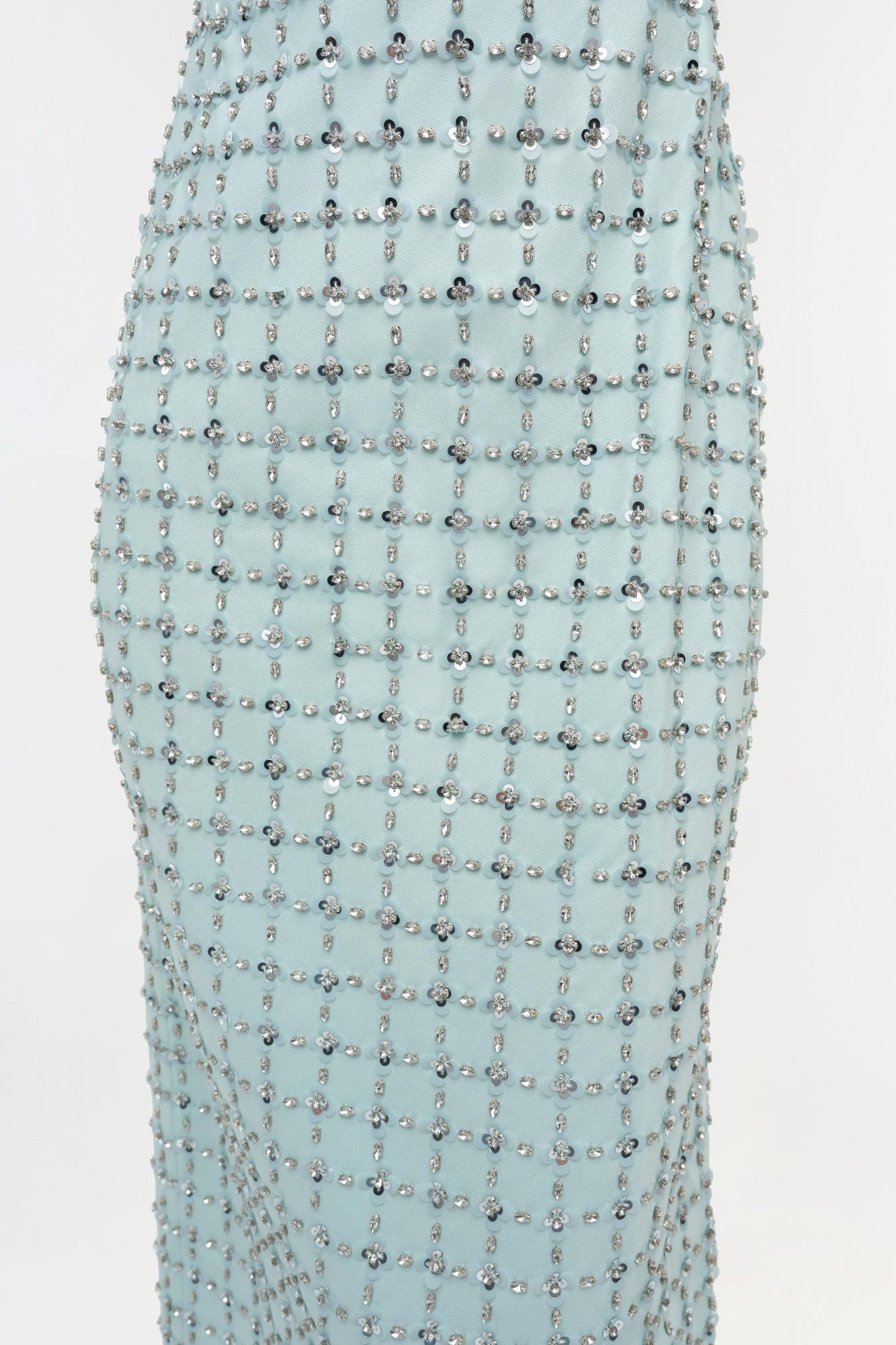 Light blue midi dress with all-over crystal and pearl beaded embellishments in grid pattern.