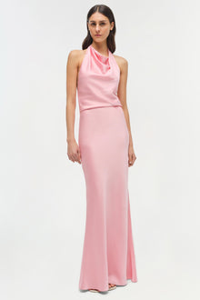 Pink satin halter gown with draped neckline and fitted silhouette extending to floor length.