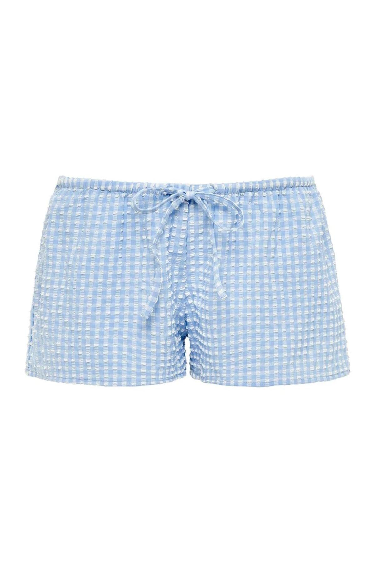 Light blue and white micro gingham shorts with drawstring waist and textured fabric.