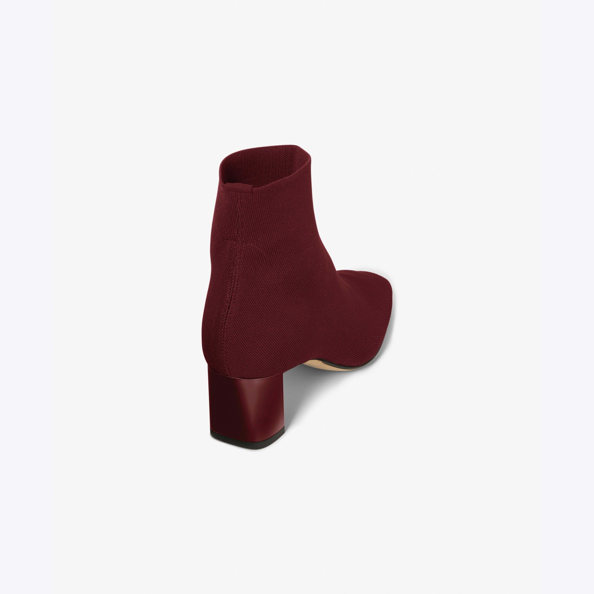 Back angle packshot image of the Zelda Boot—3D Knit in Burgundy