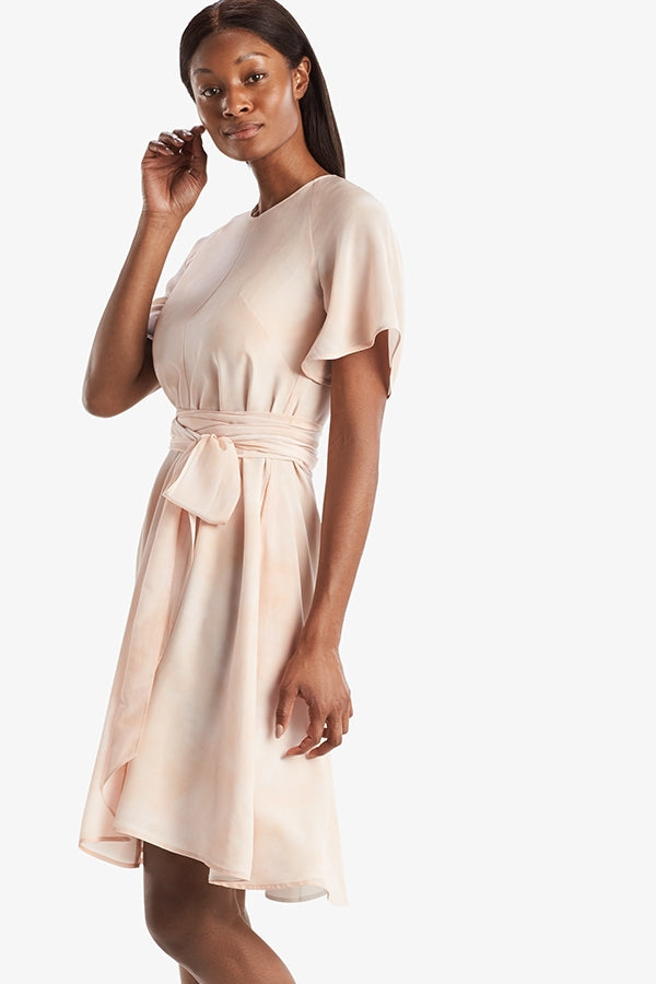 Side image of a woman standing wearing the Jessica Dress in ballet | Grid Hover | Exclude