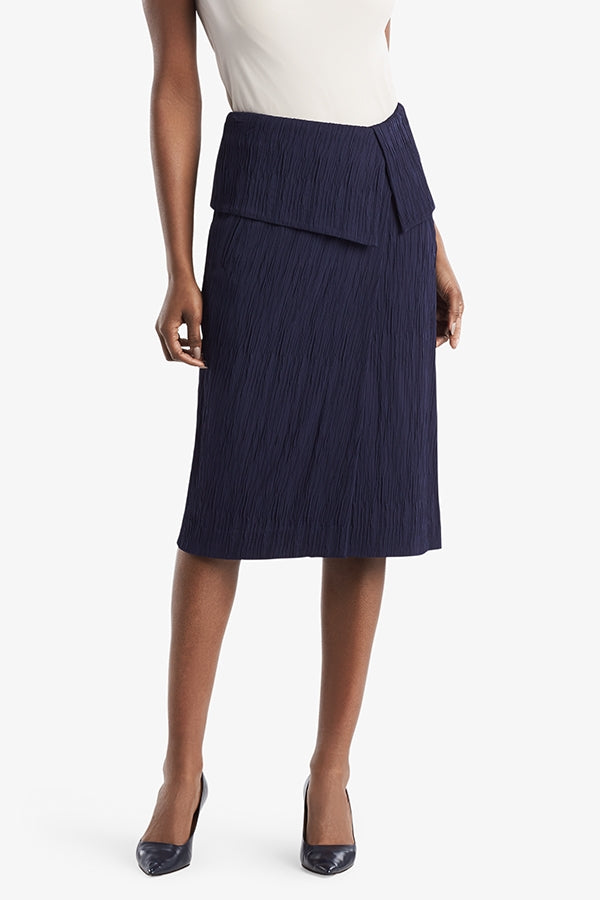 Front image of a woman standing wearing the Montgomery Skirt in aegean blue | Grid | Exclude