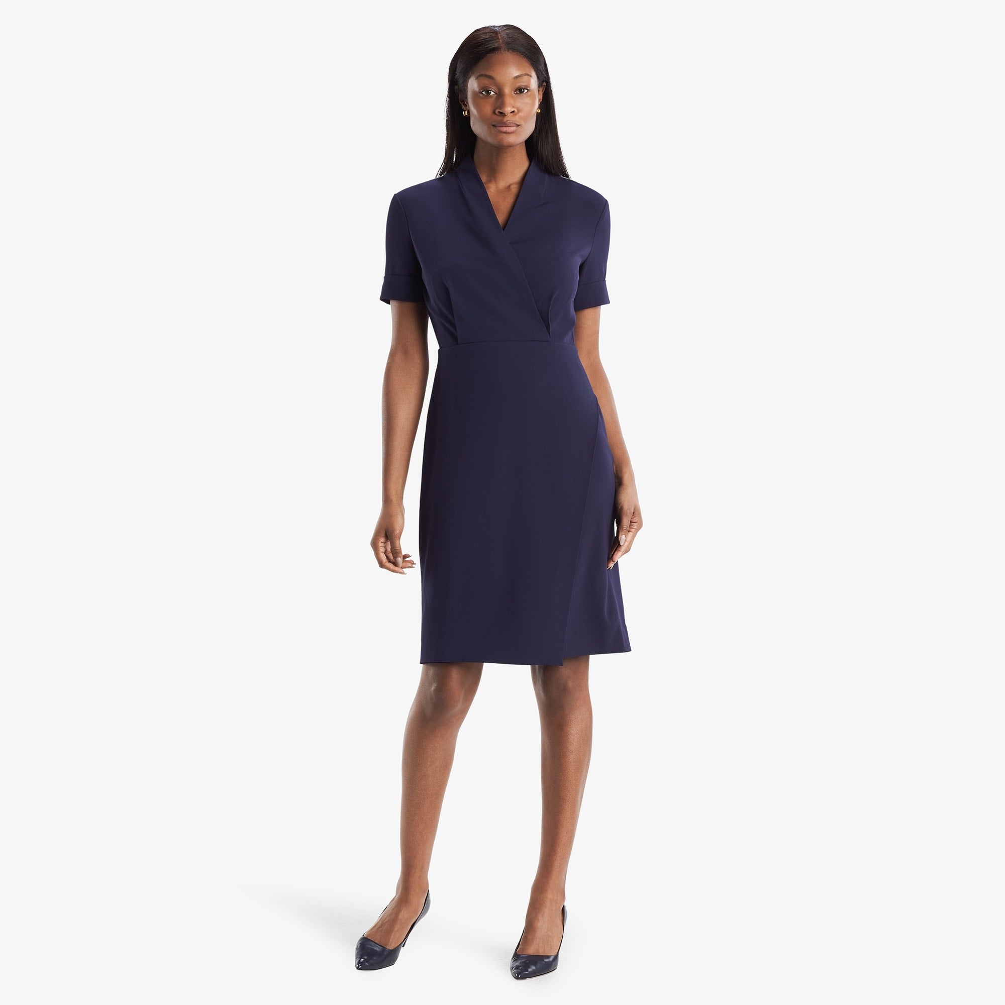 Front image of a woman standing wearing theTory Dress in dark iris | Lead