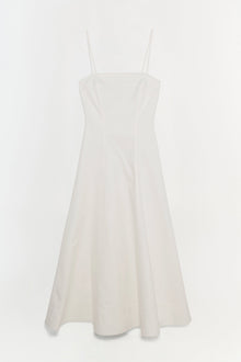 White cotton midi dress with thin shoulder straps and a fitted bodice flowing to a full skirt.