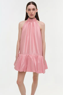 Pink sleeveless halter mini dress with gathered neckline and ruffled hem.