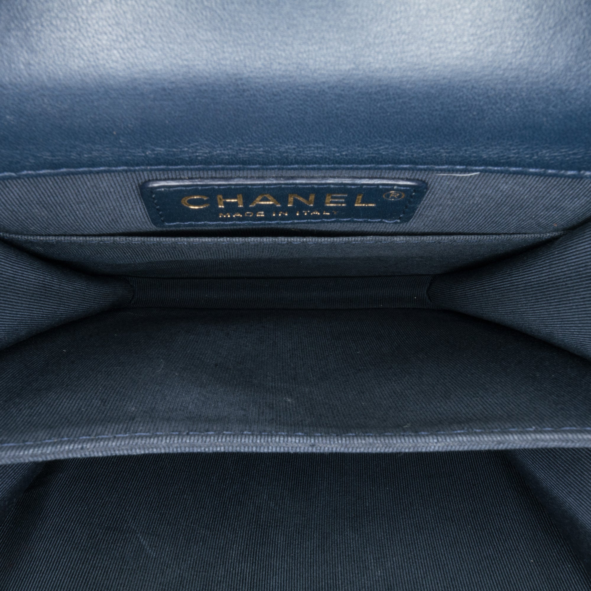 Chanel | Pre-Owned Metallic Lambskin Striped North South Boy Flap | Gold