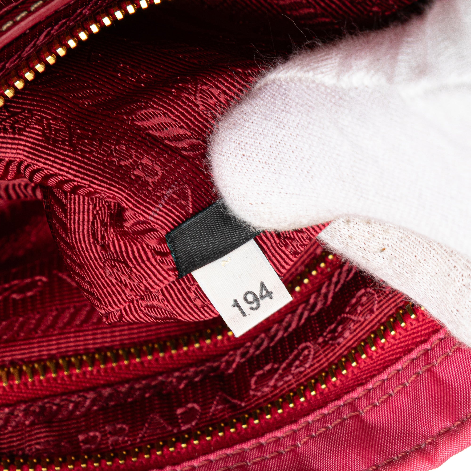 Prada | Pre-Owned Tessuto Zip Top Crossbody | Pink