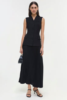 Black sleeveless vest dress with button front and pleated skirt bottom.