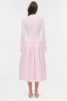 Pink midi dress with ribbed knit top and pleated taffeta skirt, shown from back.