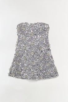 Gray strapless mini dress with crystal beads and geometric embellishments arranged in repeating floral patterns across the bo