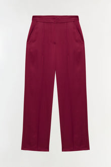 Burgundy satin wide leg pant with high waist and center crease against white background.