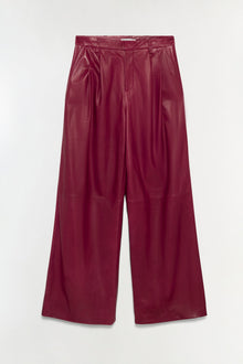Burgundy leather wide-leg pants with pleated front detail and high waistband.
