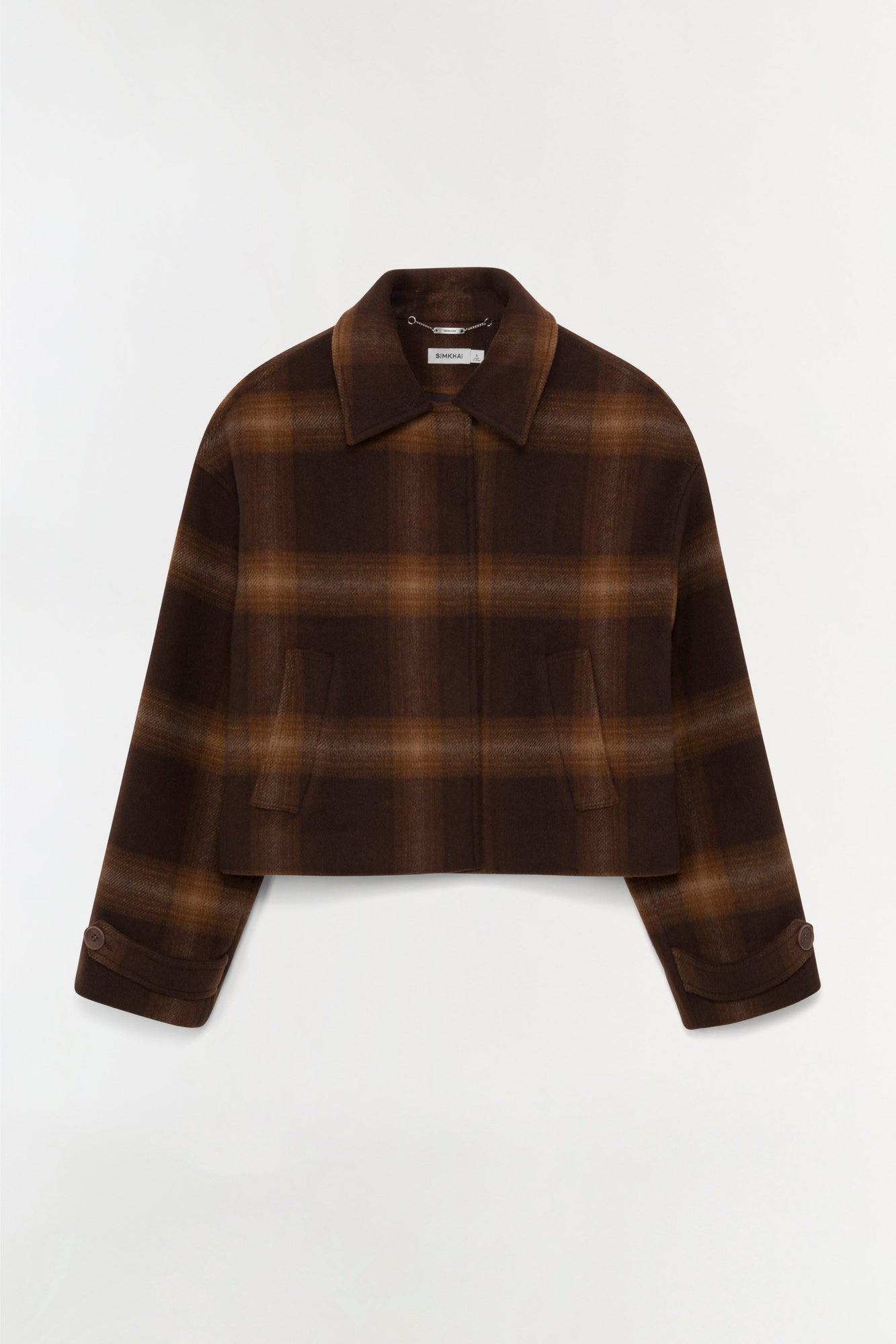 Brown plaid wool jacket with cropped length, spread collar, and button cuffs.