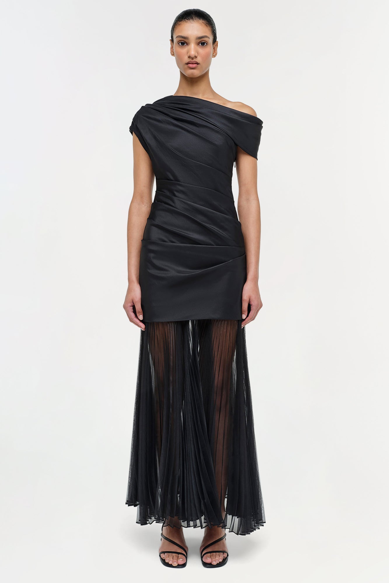 Black off-shoulder taffeta midi dress with ruched bodice and pleated sheer skirt.