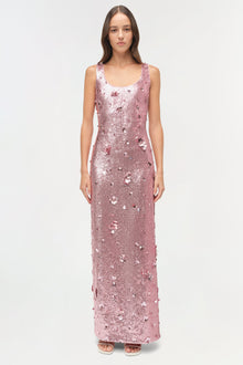 Sleeveless floor-length gown in pink sequins with scattered embellishments, scoop neckline, fitted silhouette.