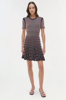 Navy knit mini dress with white wavy stripe pattern, short sleeves, and flared skirt hem.