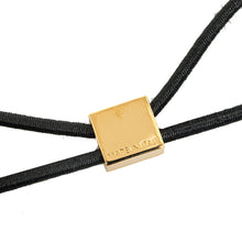 Louis Vuitton | Pre-Owned Planete Nanogram Chouchou Hair Tie | Gold