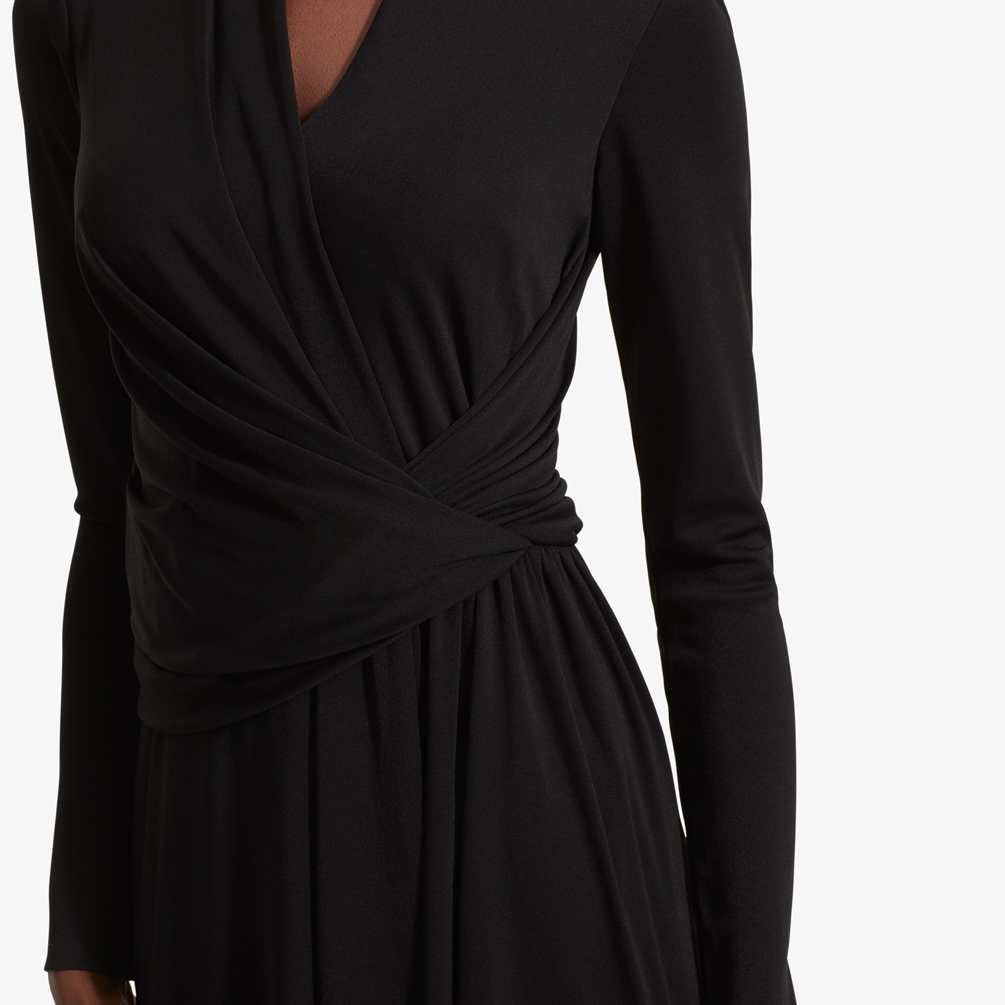 Detail image of a woman standing wearing the Morgan dress in Black | Exclude