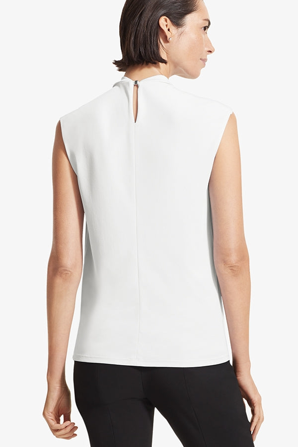 Back image of a woman standing wearing the Walters top knit crepe in Ivory | Grid Hover | Exclude