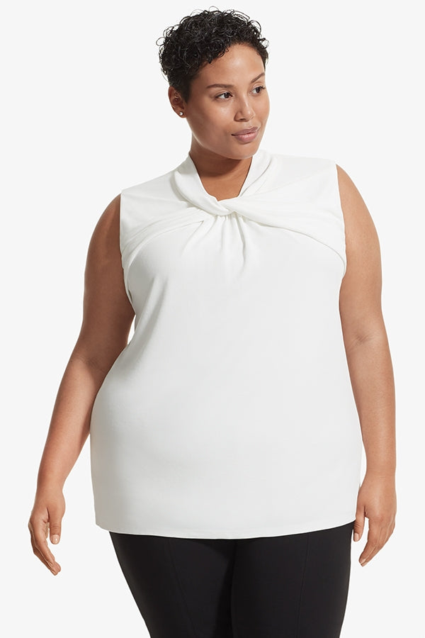 Front image of a woman standing wearing the Walters top knit crepe in Ivory | Plus | Exclude