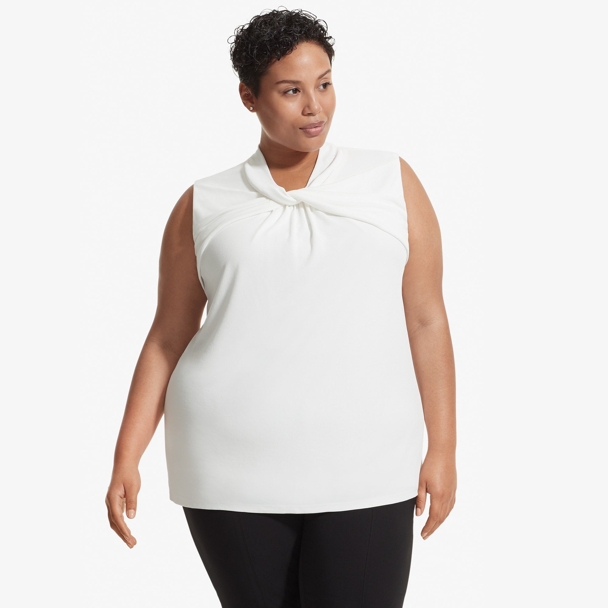 Front image of a woman standing wearing the Walters top knit crepe in Ivory | Exclude