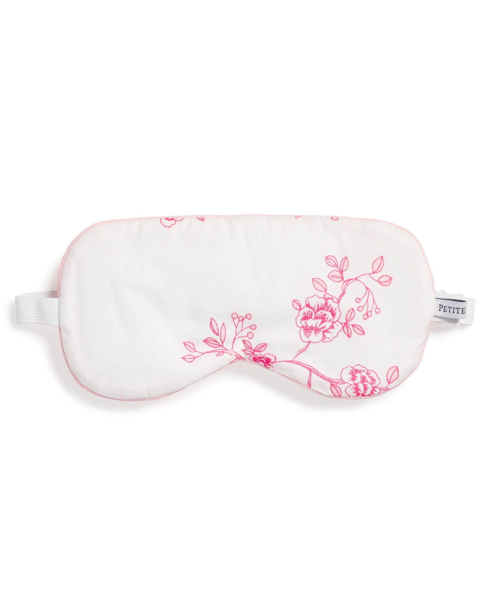 The Adults Sleep Mask in English Rose by Petite Plume features a monogrammed white design with pink floral blossoms and branches, an elastic band, and a PETITE label. Its an ideal gift for any occasion, especially when paired with matching masks for a coordinated look.