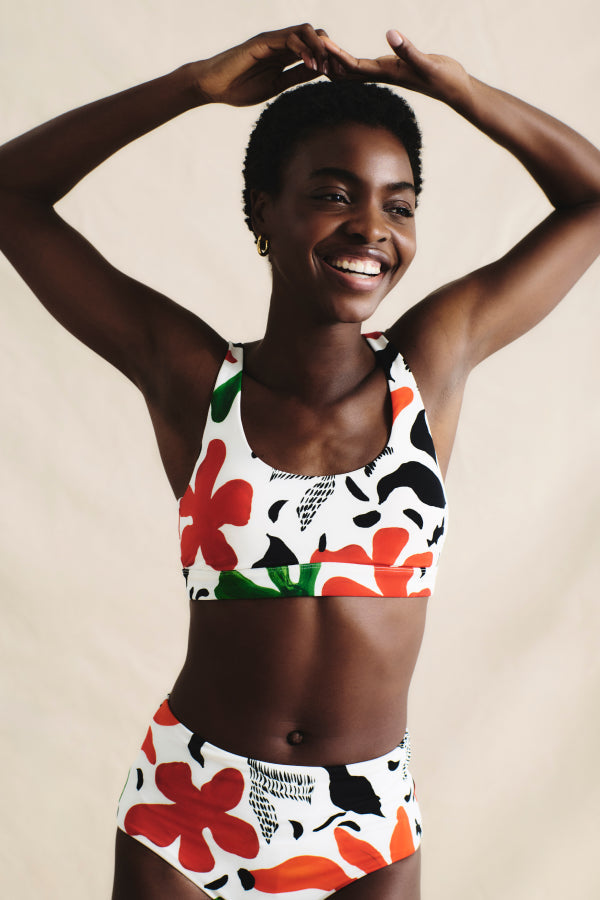 image of a woman wearing the M.M.LaFleurxAndie Portofina Bikini Bottom in cutout floral | Exclude