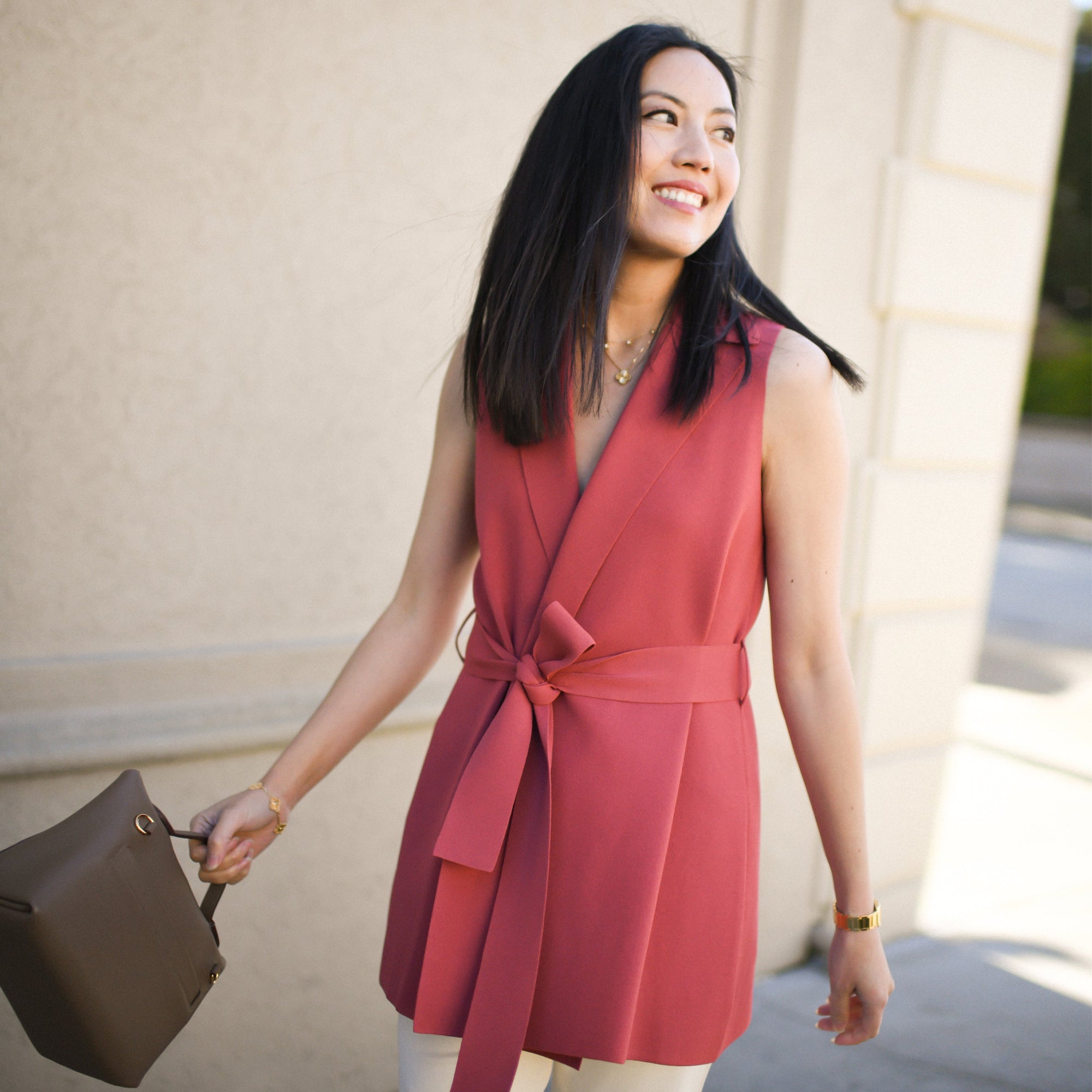 front image of Anh wearing the anh jardigan in carnation