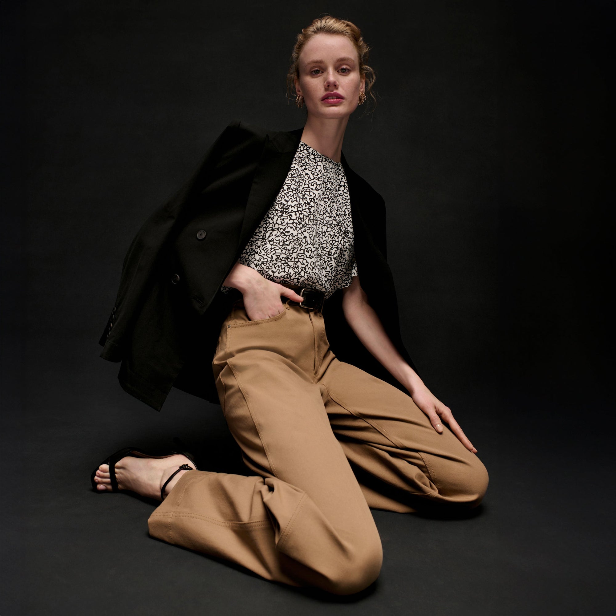 front image of a woman wearing the milo jean in saddle