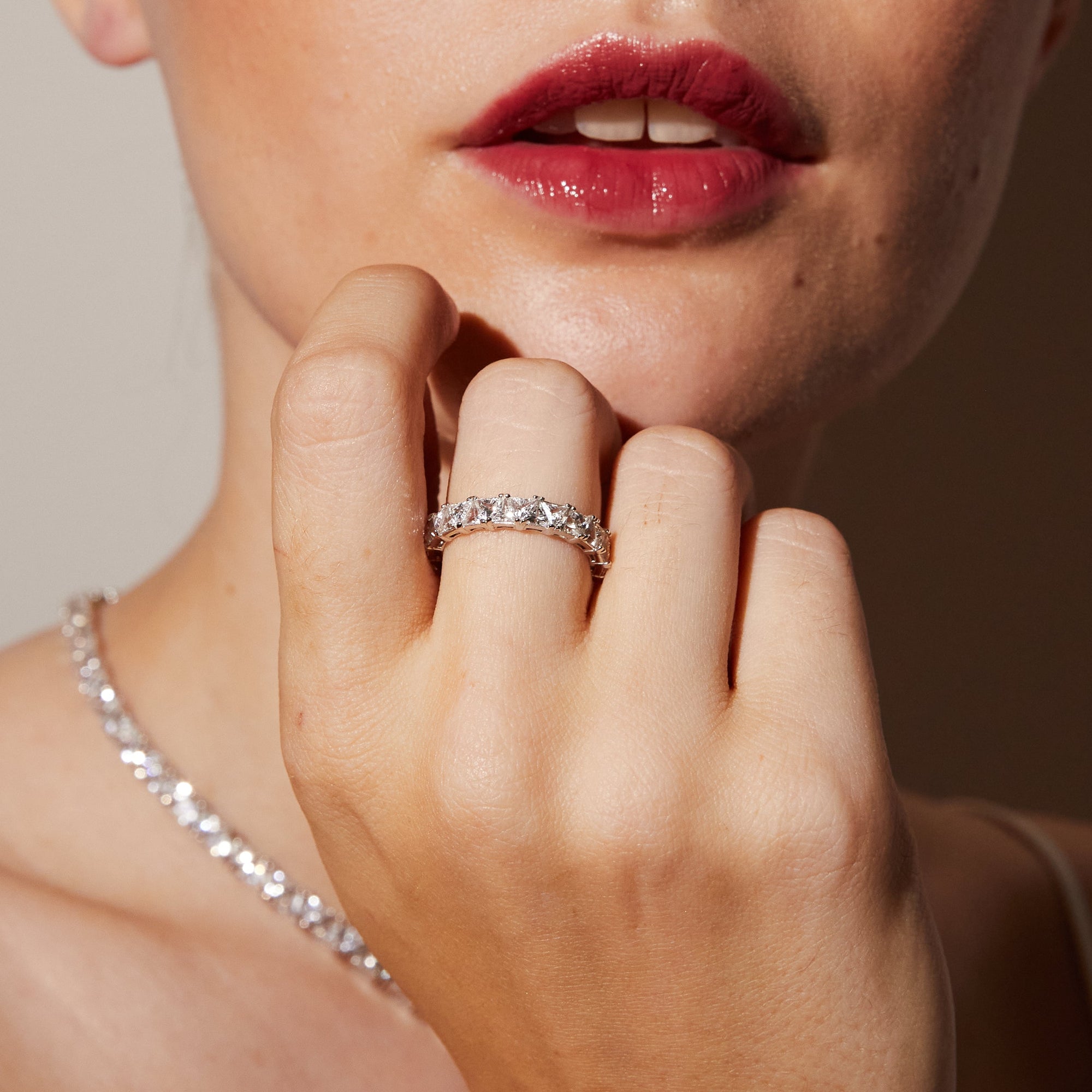 Model.  Close up of woman wearing diamond ring