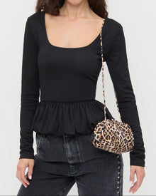 Bailey Leopard Jersey Dome Clutch, Posie Peplum Top in black, and Winona Denim Barrel Pant in black with crystal embellishments. 