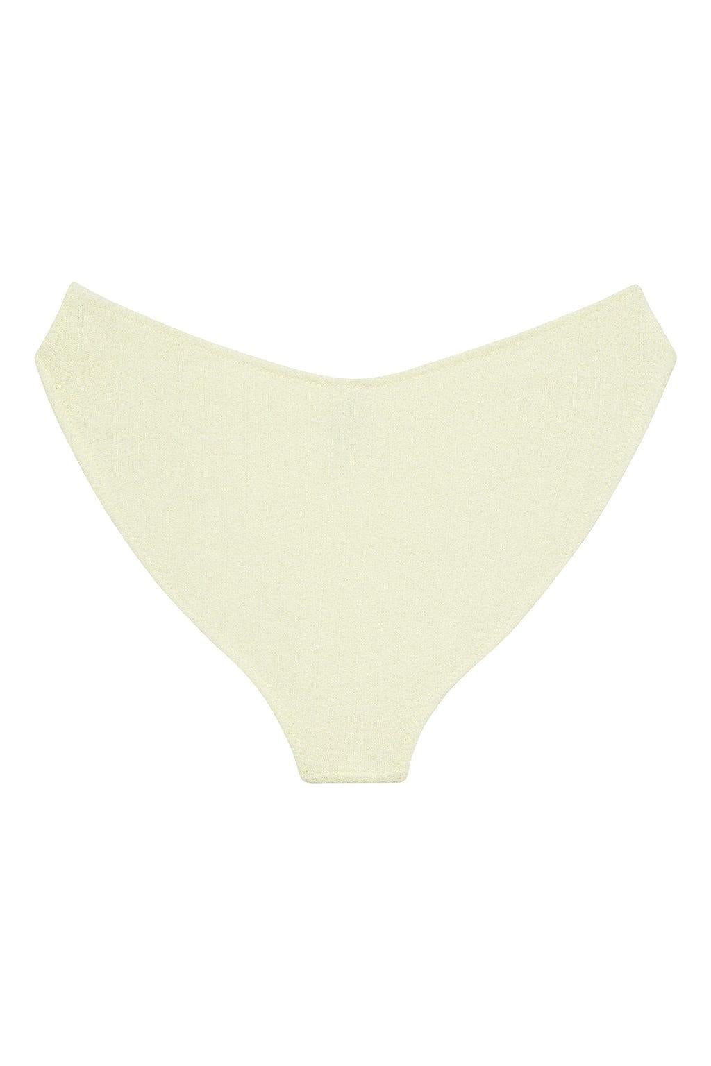 Cream-colored ribbed bikini bottom with high-waisted cut and zig-zag stitching detail.