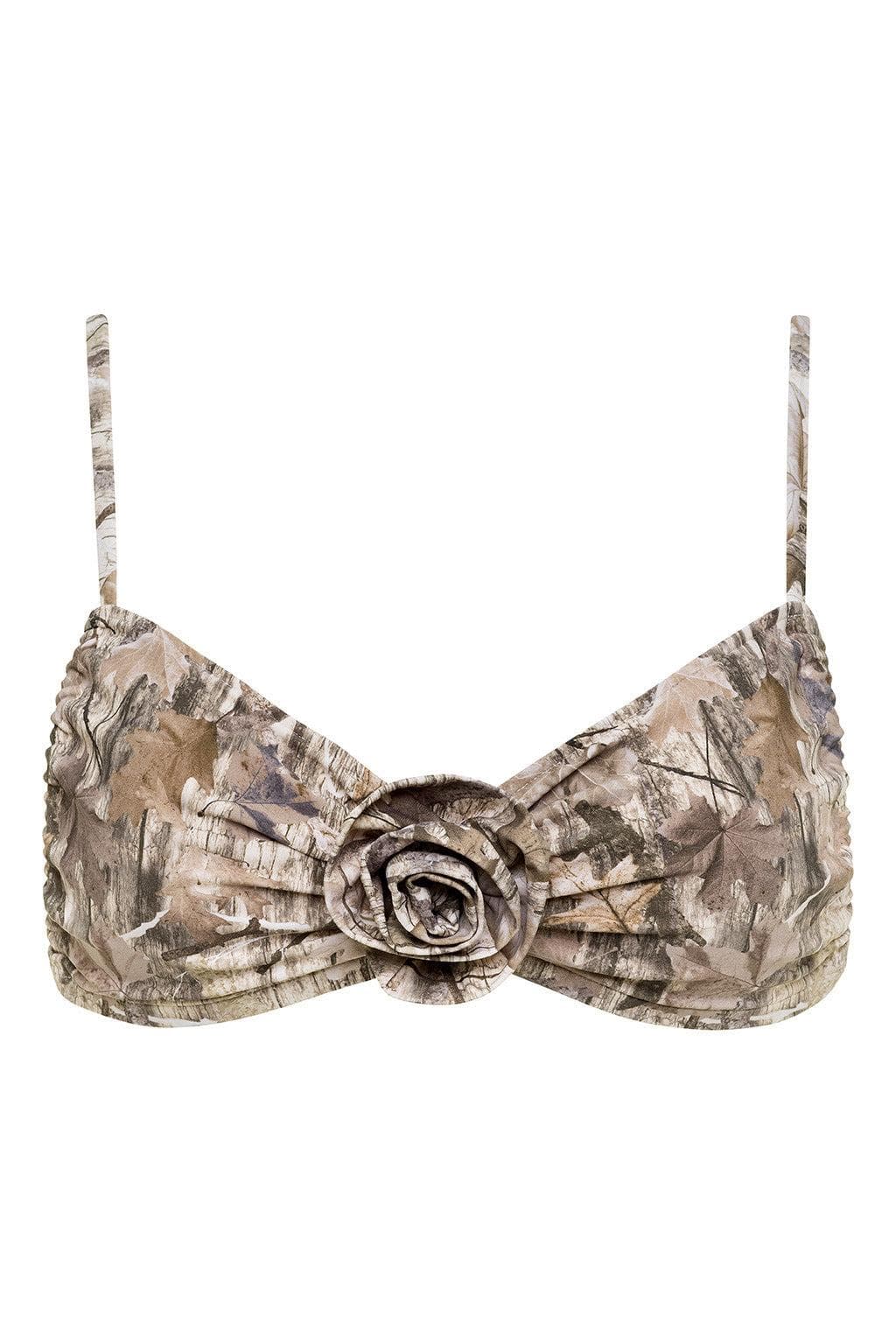 Camo bikini top with camouflage print in beige and brown tones, featuring thin shoulder straps and a decorative rosette detai