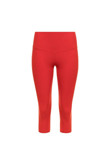 Red capri legging with high waistband and cropped length ending below the knee.