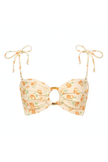 Cream bandeau bikini top with orange cherry print and tie-shoulder straps with striped details.