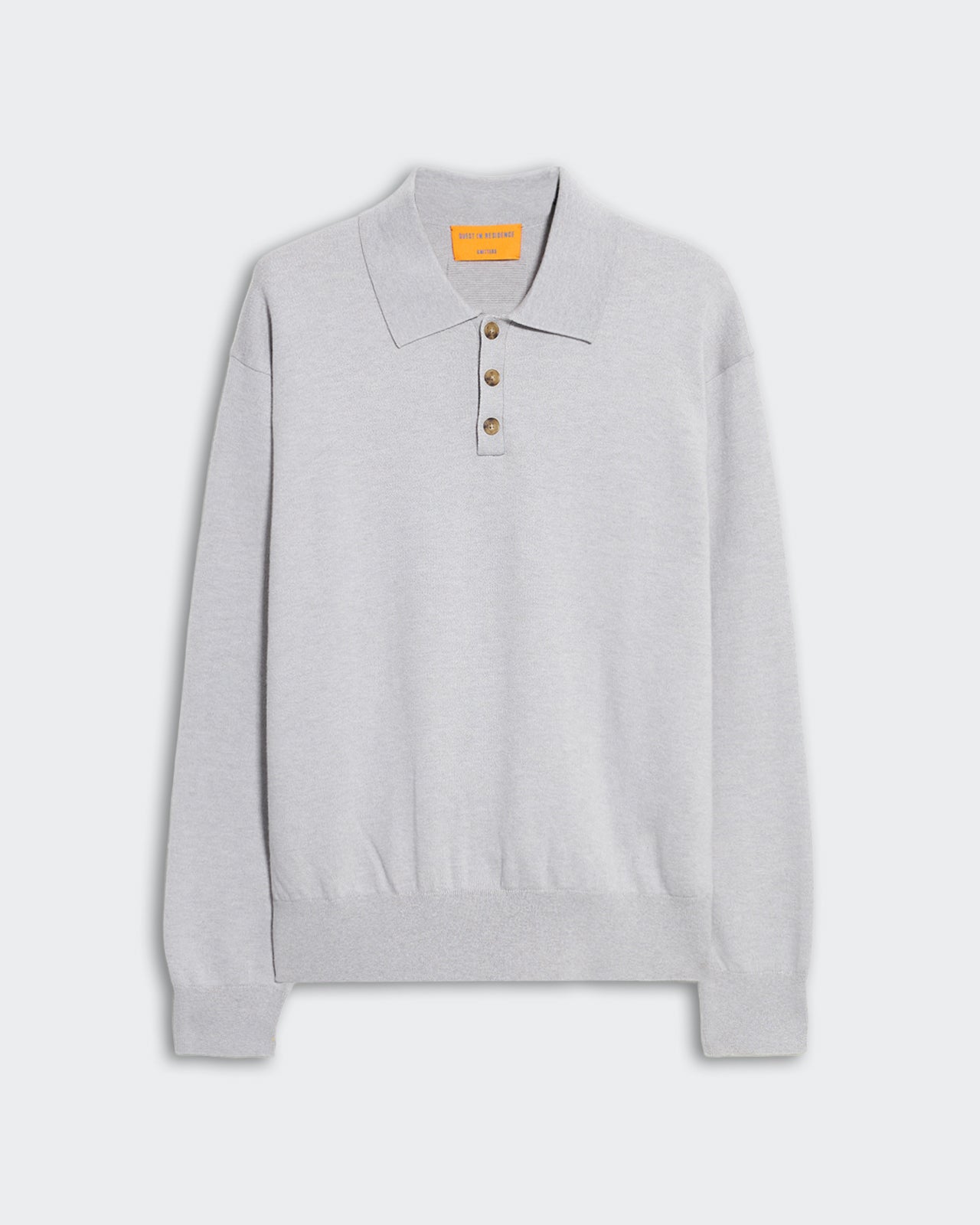 Allday Polo - Stone, a soft light gray long-sleeve polo knit with a relaxed fit, featuring a classic pointed collar, four-button placket, and ribbed cuffs and hem, displayed flat on a neutral background.