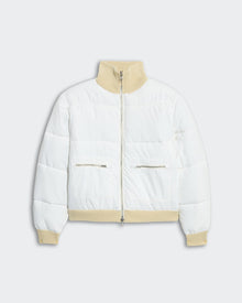 White quilted puffer jacket with beige ribbed collar, hem, cuffs, front zip, and zippered side pockets for women.