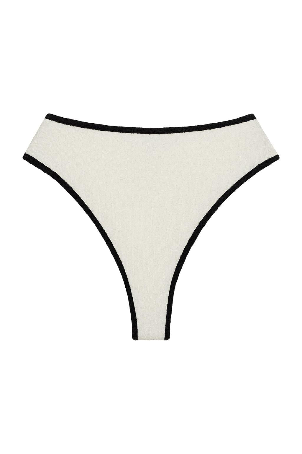 Cream terry rib bikini bottom with black binding on waistband and leg openings.