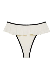 Cream bikini bottom with black binding and ruffled overlay at waistband.
