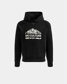 The Rudsak DARWIN - M525502 Black men’s hoodie is crafted from soft cotton-blend fleece, with a front pocket and chest graphic of snow-covered mountains, crossed skis, and bold 