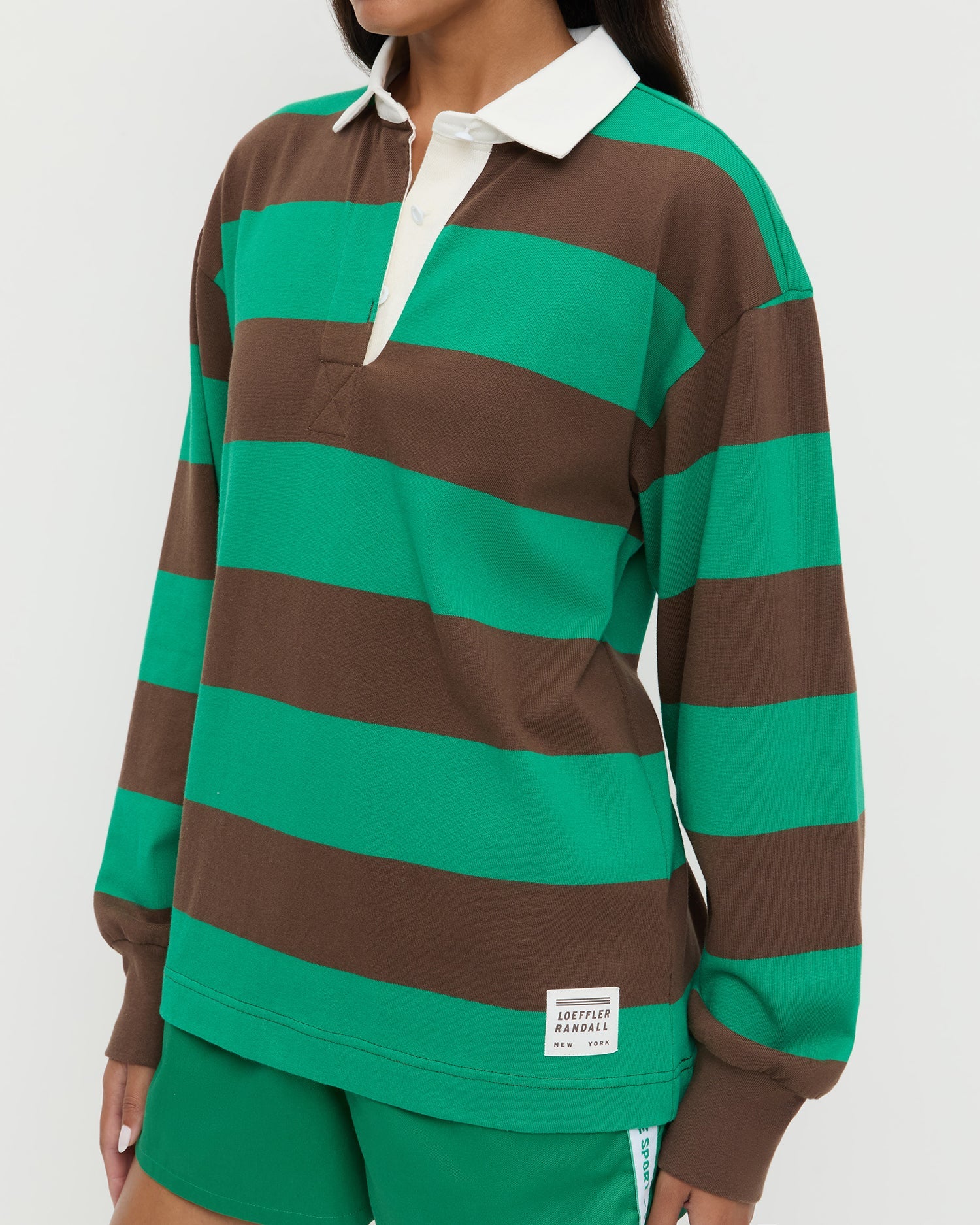 Evan Rugby Shirt in green and brown striped cotton and Cole Short in green cotton.